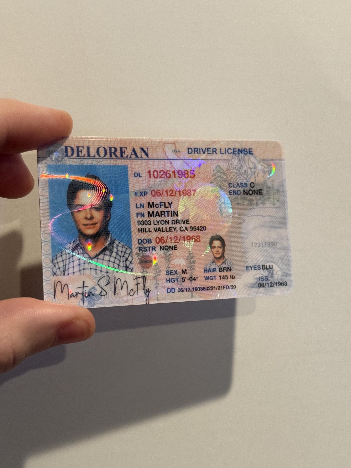 Marty McFly custom PVC card with hologram displayed inside hand